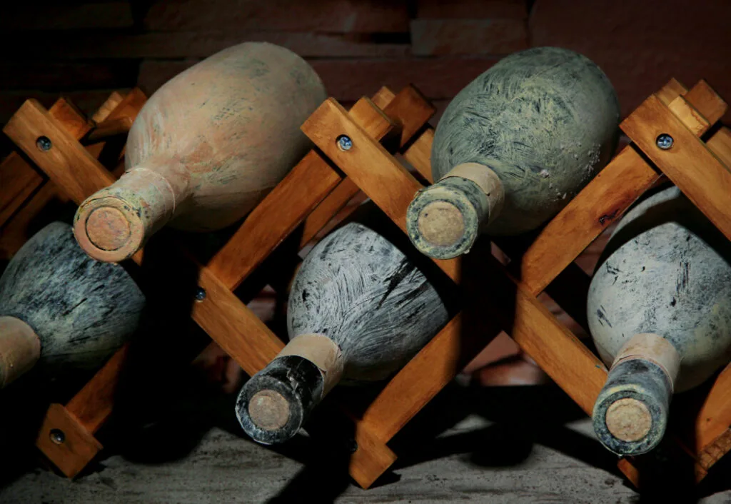 Aged Alcohol Bottles on the Shelf