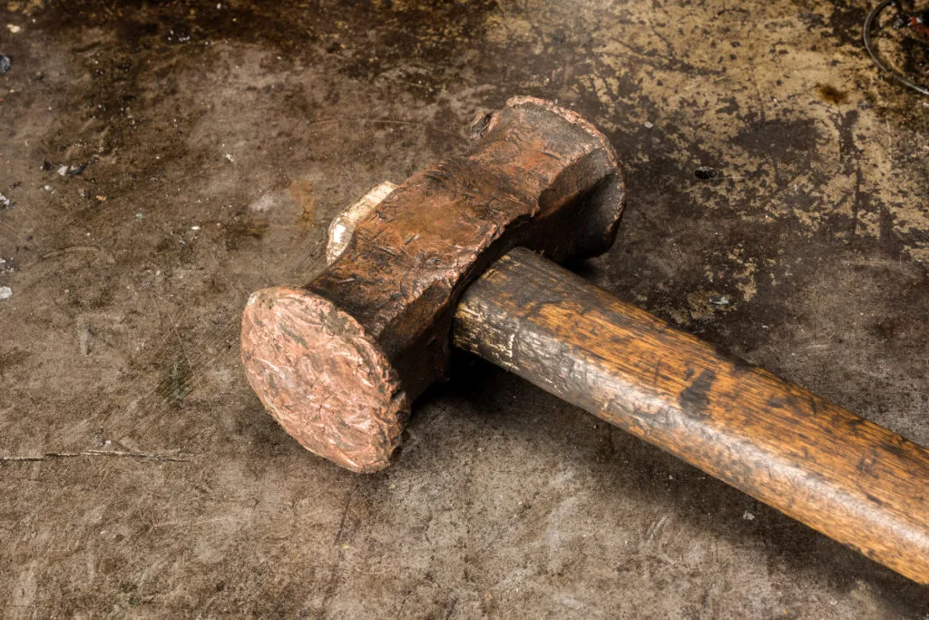 Brick hammers with typical chisel tools