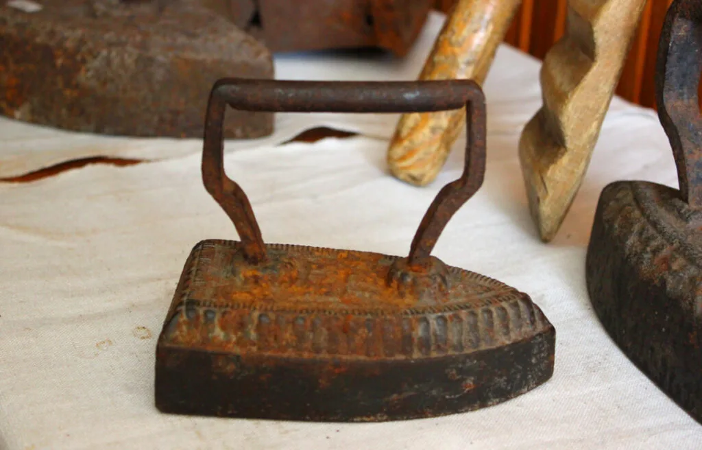 Antique Meta-fuel Sad Iron with enclosed Fuel Tank