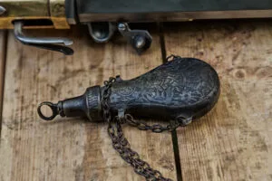 Black Antique Powder Flask from the 1800s