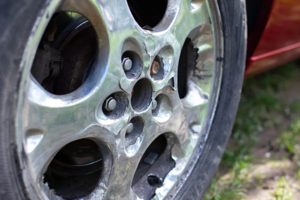 An Old & Oxidized Hubcap on Tire