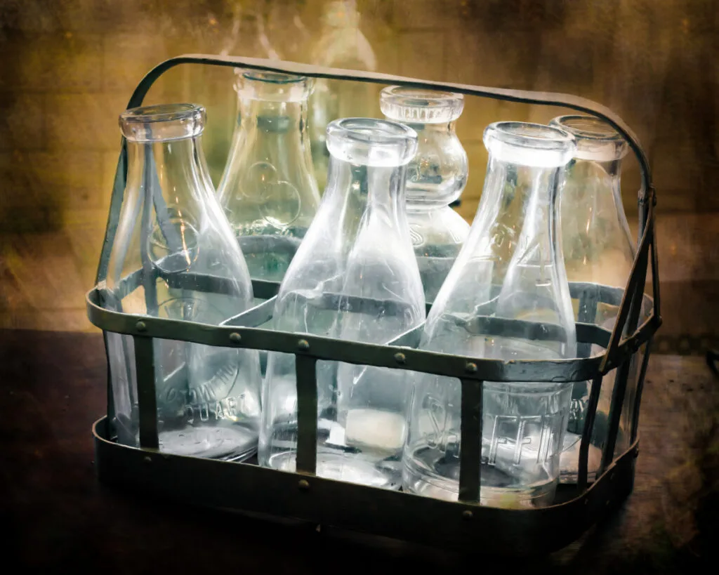 Old & Wide Duraglas Milk Bottles in a Crate