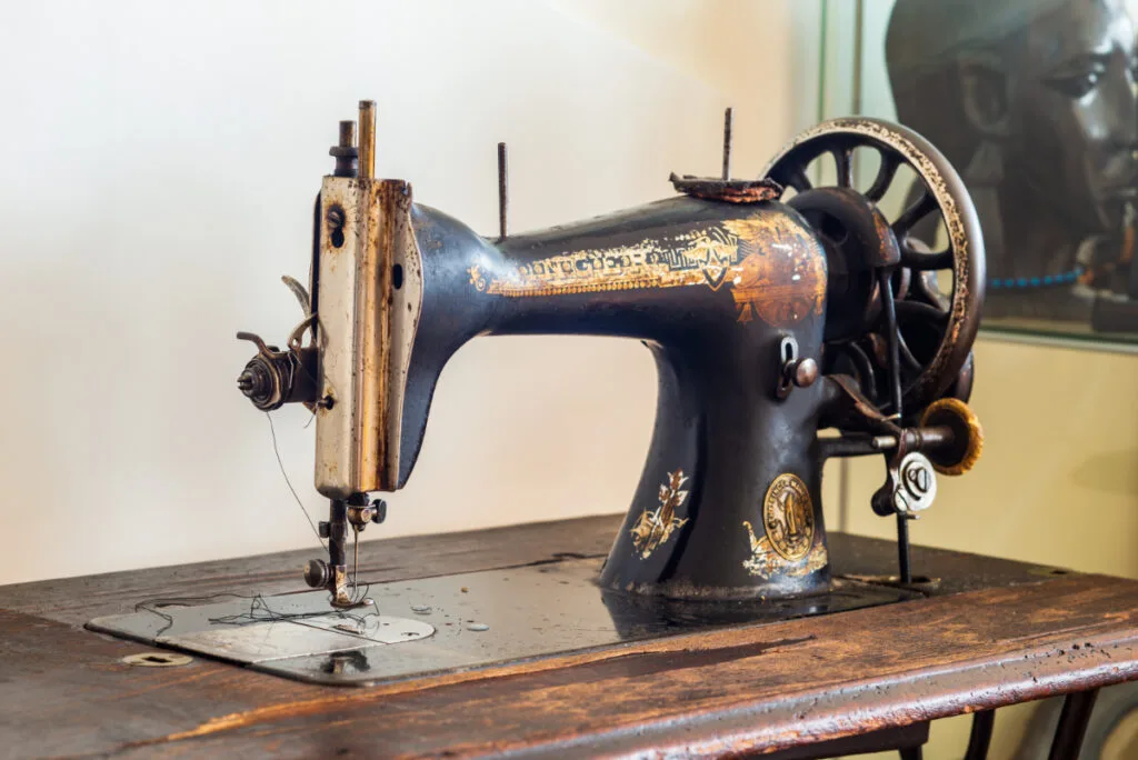 Vintage Singer Sewing Machine with a Wooden Table