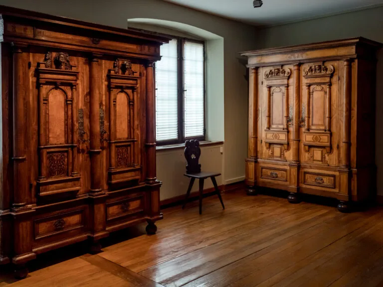 Two Aged & Rustic Armoires in the Living Room