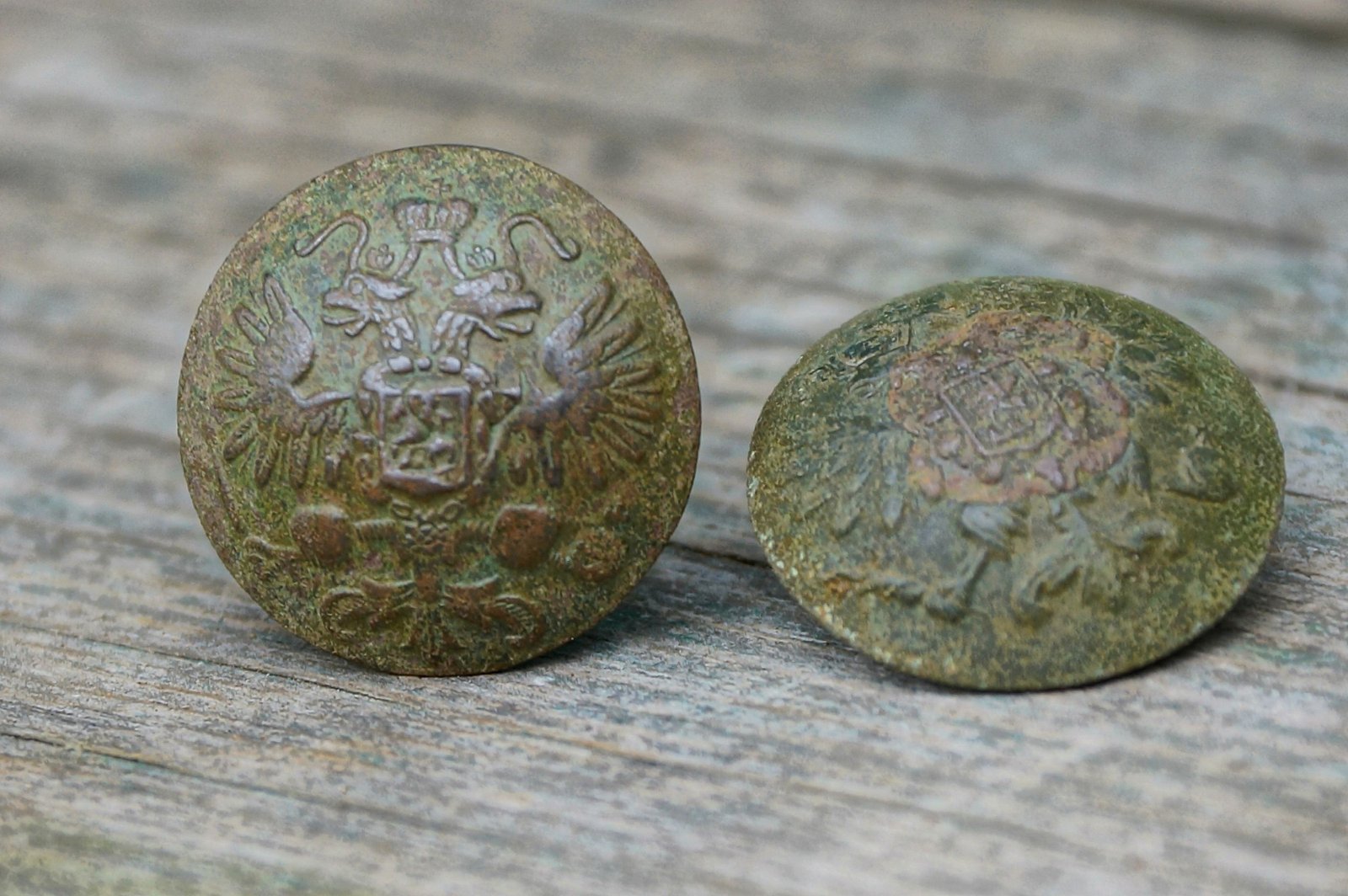 Two Antique Buttons With Embossments 