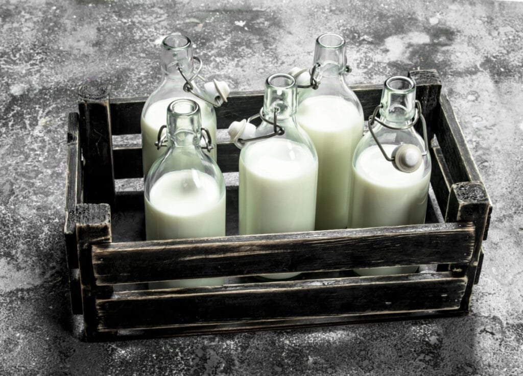 Vintage Milk Bottles in Crate